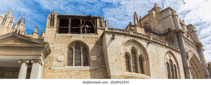 Panoramic detailed view at the lateral ornaments facade, gothic monument building Primate Cathedral of Saint Mary of Toledo