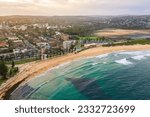 Panoramic drone aerial view over Dee Why beach and Dee Why lagoon, Northern Beaches Sydney NSW Australia