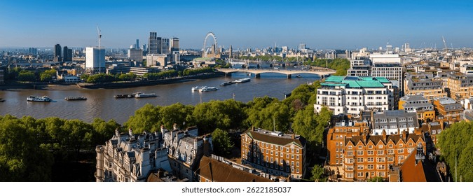 Panoramic drone image of London’s skyline featuring the River Thames, The Shard, and commercial architecture—ideal for business, travel, and real estate use