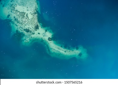 Panoramic Drone View Of A Flock Of Birds Flying Over Submerged Areas Of Rocky Soil On Lake Of Banyoles (Catalonia).