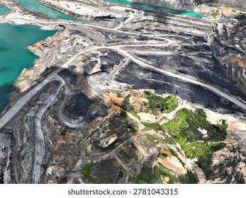 Panoramic Drone View of Open Pit Mining Activities and Large Water Reservoirs for Industrial Cooling and Drainage