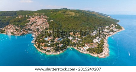 Panoramic drone view of Rabac bay and hillside town on the Adriatic coast, Croatia