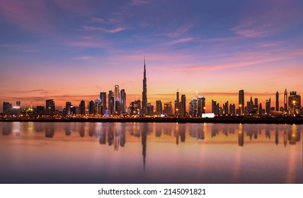 Panoramic Dubai skyline with Reflection in Pastel Sunset colors  - Shutterstock ID 2145091821