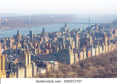 Panoramic elevated view of Central Park, Upper West Side and the George Washington Bridge with Hudson River in Fall. Manhattan, New York City, USA