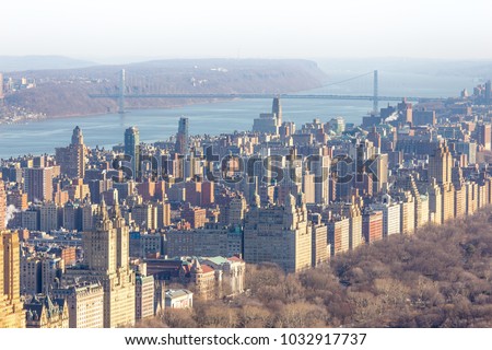Panoramic elevated view of Central Park, Upper West Side and the George Washington Bridge with Hudson River in Fall. Manhattan, New York City, USA