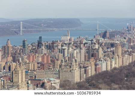 Panoramic elevated view of Central Park, Upper West Side and the George Washington Bridge with Hudson River in Fall. Manhattan, New York City, USA