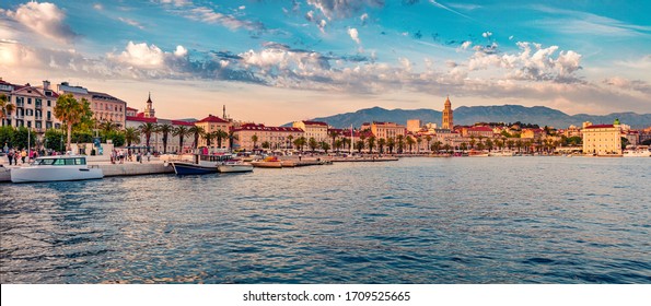 Panoramic evening cityscape of Split town. Wonderful summer sunset in Croatia, Europe. Beautiful world of Mediterranean countries. Traveling concept background.