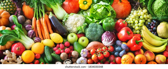 Panoramahintergrund mit frischem Obst und Gemüse aus biologischem Anbau für eine ausgewogene Ernährung. Konzept für gesunde Lebensmittel
