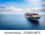 Panoramic front view of a large cargo ship carrying containers for import and export, business logistic and transportation concept wth copy space 