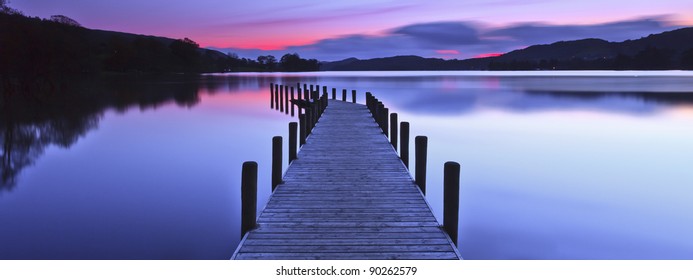 A Panoramic Image Of A Jetty At Coniston Water