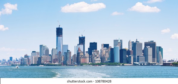 Panoramic Image Of Lower Manhattan Skyline From Staten Island Ferry Boat, New York City.