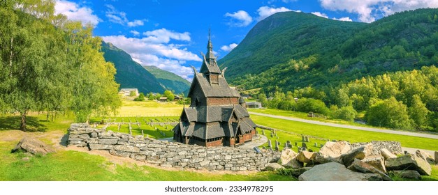 Panoramic landscape with ancient Borgund Stave church (wooden church). Norway