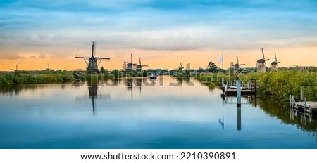Panoramic landscape with historic windmills, Kinderdijk, the Netherlands.