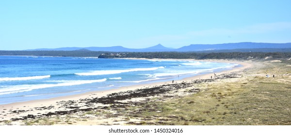 Panoramic Landscape Of Sussex Inlet Beach In New South Wales, Australia. Sunny Day In Winter Time, Few People On The Beach. 