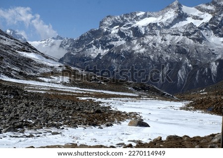 Panoramic landscape view of beautiful snowcapped Zero Point, or Yumesamdong, and distant Himalayan peaks. ZERO POINT SIKKIM (Yumesadong) is situated at the elevation of 15,3000ft.