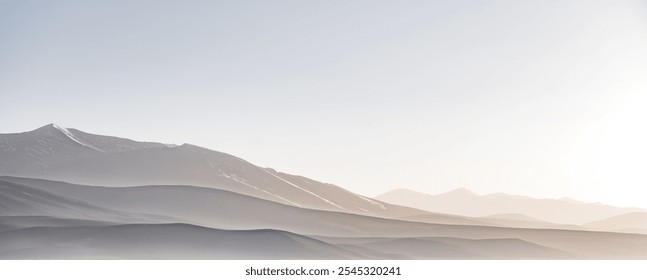 Panoramic minimalist landscape of mountain ranges in Pamir in the Tien Shan Mountains in Tajikistan, silhouette of mountain peaks, landscape for the background - Powered by Shutterstock