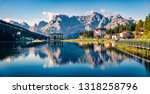 Panoramic morning view of Misurina village, National Park Tre Cime di Lavaredo, Location Auronzo, Dolomiti Alps, South Tyrol, Italy, Europe. Colorful summer scene of Misurina lake.