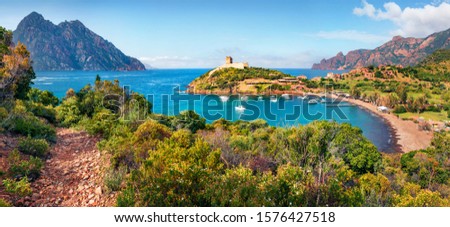 Panoramic morning view of Port de Girolata - place, where you can't get by car. Splendid summer scene of Corsica island, France, Europe. Stunning Mediterranean seascape.