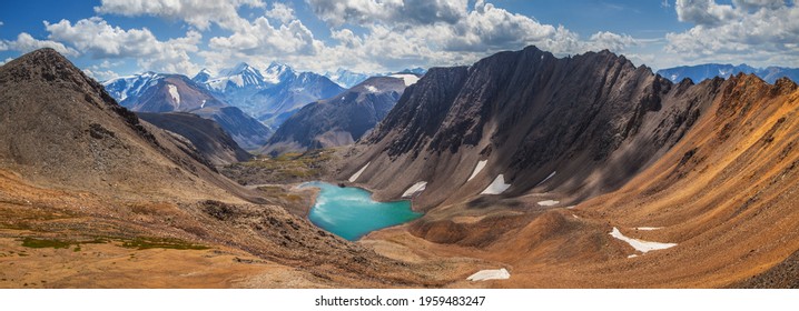 Panoramic Mountain Landscape, Altai. Lake In A Deep Gorge, Colored Rocks. Summer Travel In The Mountains, Hiking. 