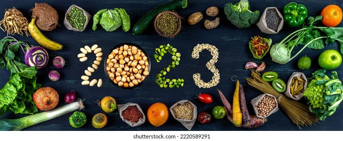 Panoramic -New Year 2023 VeganFruits,vegetables,organic cereals - Shutterstock ID 2220589291