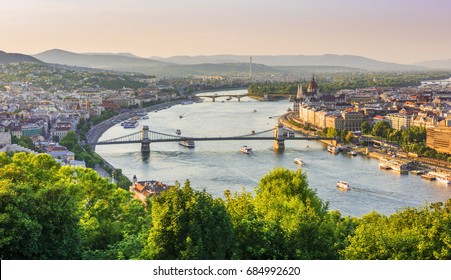 Panoramic night view of Budapest from Gellert Hill. Danube River, Chain Bridge, Parliament Building, Buda and Pest views. Budapest, Hungary.
 - Shutterstock ID 684992620