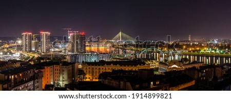 Panoramic night view of downtown Belgrade, river Sava and New Belgrade from height