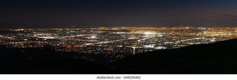 Panoramic Night View Of Urban Sprawl In San Jose, Silicon Valley, California; ; The Downtown Area Buildings Visible On The Right