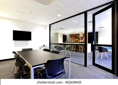 Panoramic Office Meeting Room With Huge Glass Walls And Opened The Door