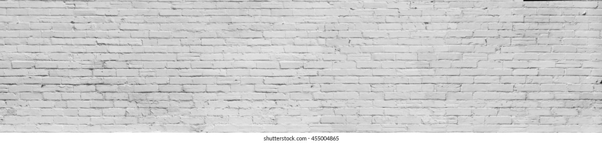 Panoramic  Old  white grey painted bricks wall 