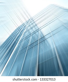 Panoramic and perspective wide angle view to steel blue background of glass high rise building skyscrapers in modern futuristic downtown at night Business concept of successful industrial architecture