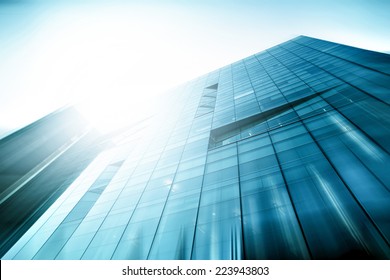 Panoramic and perspective wide angle view to steel light blue background of glass high rise building skyscraper commercial modern city of future. Business concept of success industry tech architecture - Shutterstock ID 223943803