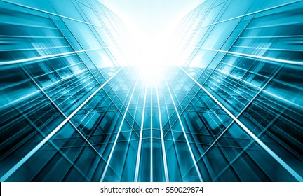 Panoramic and perspective wide angle view to steel light blue background of glass high rise building skyscraper commercial modern city of future. Business concept of success industry tech architecture - Shutterstock ID 550029874