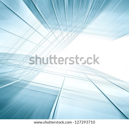Panoramic and perspective wide angle view to steel blue background of glass high rise building skyscrapers in modern futuristic downtown at night Business concept of successful industrial architecture