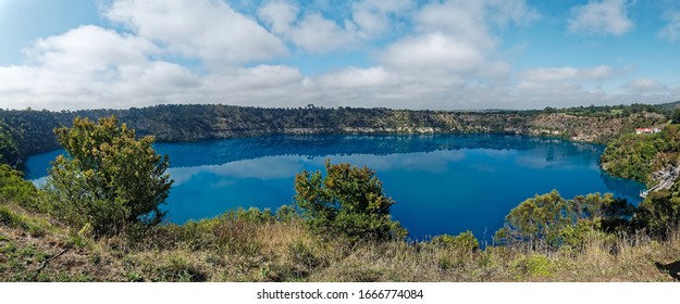 Panoramic photo of the Blue Lake Volcano in full colour Turquoise between December and February each year then changes back to a normal lake water scene. Mount Gambier,  South Australia.