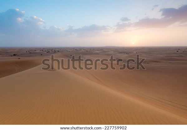 Panoramic photo of a landscape of a desert in\
the United Arab\
Emirates