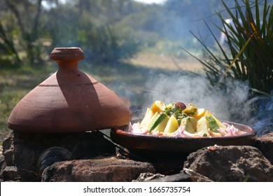 Panoramic Photo Of A Moroccan Tagine Cooking In Nature