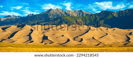 Panoramic photopgraph of Great Sand Dunes National Park in Colorado.