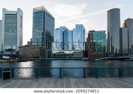 Panoramic picturesque city view of Boston Harbour and Seaport Blvd at day, Massachusetts. An intellectual, technological and political center. Building exteriors of financial downtown.