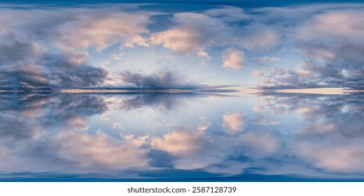 Panoramic reflection of soft clouds and vibrant skies over scenic landscapes.