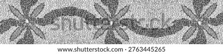Panoramic repeating pebble mosaic floor with star motifs and waves. Intricate black and white stone paving.