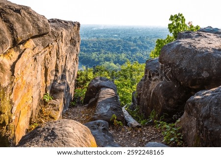 Panoramic scenery landscape view of Pha Hin Son Viewpoint and green rainforest mountain at Khao Ito National Park viewpoint in Prachin Buri, amazing viewpoint nature hill.