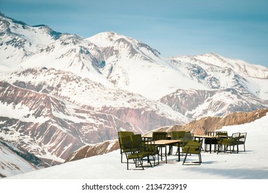 Panoramic Scenic View Of Outdoor Mountain Cafe Empty Seats With No People In Gudauri Ski Resort At The End Of Season