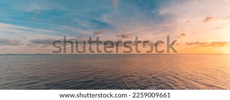 Panoramic sea skyline beach. Amazing sunrise beach landscape. Panorama of tropical beach seascape horizon. Abstract colorful sunset sky light tranquil relax summer seascape freedom wide angle seascape