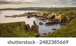 Panoramic seascape view of St. Abbs, small fishing village on the east coast of Scotland