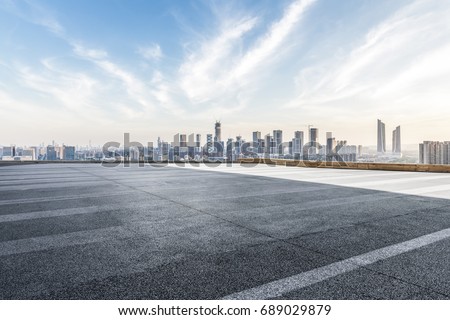 Panoramic Shanghai skyline and buildings with empty road