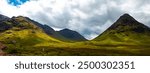 A panoramic shot of the beautiful landscape in the Scottish Highlands. 