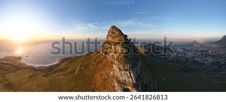 A panoramic shot of the Table Mountain in Cape Town, South Africa on a golden sunset