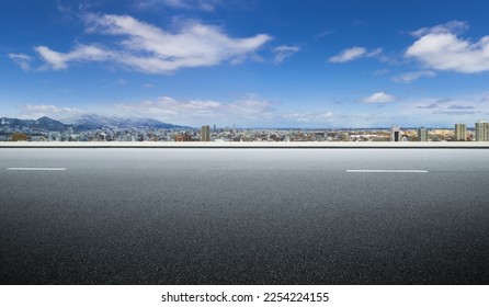 Panoramic side view asphalt road cityscape background - Shutterstock ID 2254224155