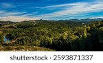 Panoramic of the Sierra Morena and its abundant vegetation, and in the foreground, the Odiel River, in the province of Huelva (Andalusia, Spain).