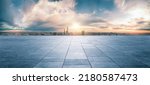 Panoramic sky and building with empty concrete square floor